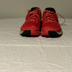 Men's size 13 Nike running shoes.